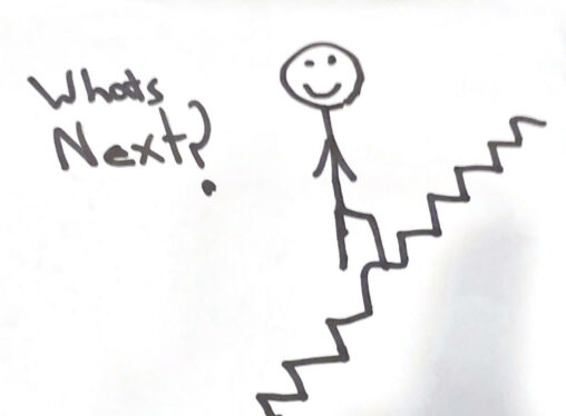 A person going up a large stair case with the words \
